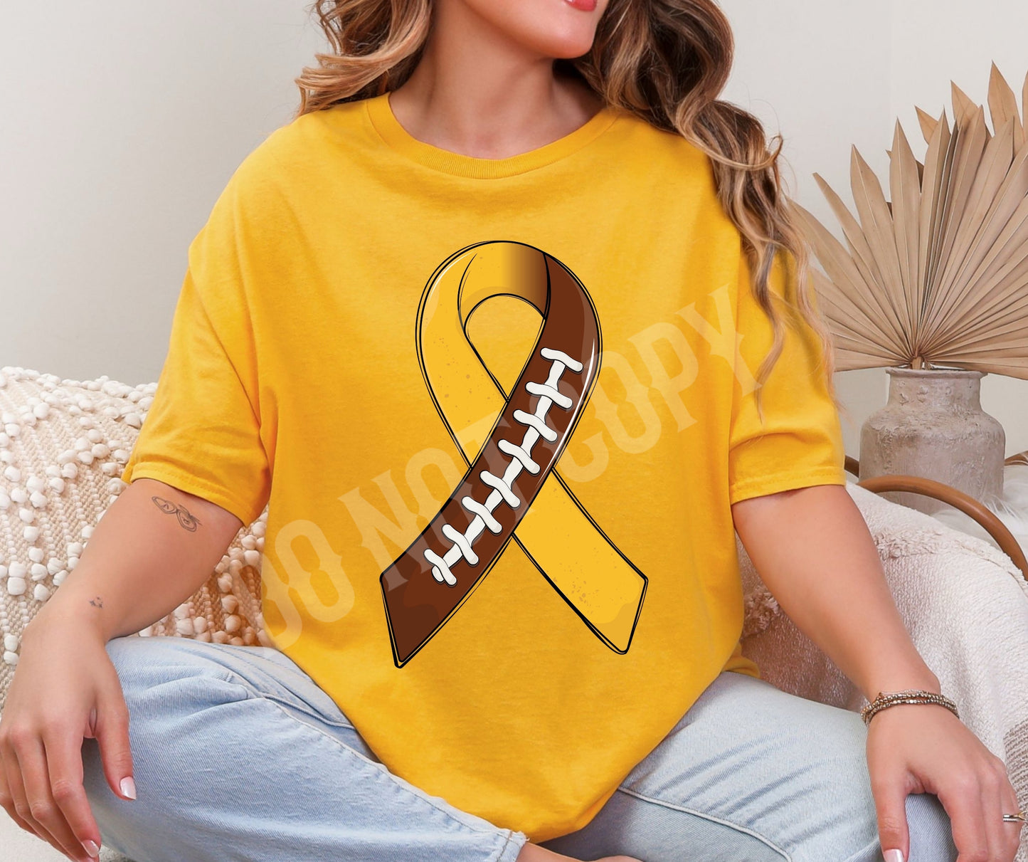 Childhood cancer awareness football ribbon
